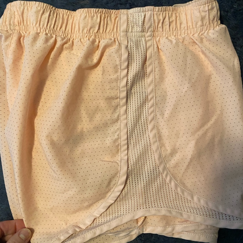 Nike Peach Agave Dolphin Hem Athletic Shorts